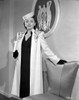 Lenore Aubert on an Embroidered Coat standing Pose Photo Print - Item # VARCEL693283