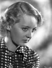 Bette Davis Portrait in Looking Slightly Down in Marcel Wave and Polka Dot Black Shirt Photo Print - Item # VARCEL693345