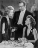 Greta Garbo smiling with a Lady and a Man standing Photo Print - Item # VARCEL693387