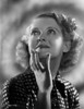 Bette Davis Portrait Hand on the Chin Looking Up in Polka Dot Black Dress with Short Curls Photo Print - Item # VARCEL693398