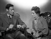 Bette Davis Scene from a Film Seated on a Chair in High Neck Long Sleeve Shirt with scarf Photo Print - Item # VARCEL693492