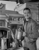John Payne holding a teapot Photo Print - Item # VARCEL693535