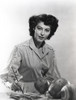 Ava Gardner on a Long Sleeve Top and Painting Portrait Photo Print - Item # VARCEL693651