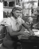 Doris Day Seated in Classic Candid Photo with Doll Photo Print - Item # VARCEL693800