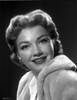 Anne Baxter on a Soft Coat smiling and posed Photo Print - Item # VARCEL693822