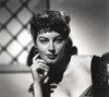 Ava Gardner posed in Black Gown with Hand on Cheeks Photo Print - Item # VARCEL693833