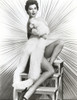Ava Gardner posed in White Lingerie on Ladder with White Background Photo Print - Item # VARCEL693897
