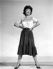 Anne Baxter standing and smiling with Hands on Waist Photo Print - Item # VARCEL693911