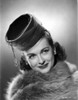 Joan Bennett on a Furry Cloth on Top and smiling Photo Print - Item # VARCEL694051