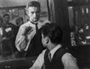 James Dean Scene from a Film Knocking on a Reinforced Glass Window in White Collar Shirt and Black Necktie Photo Print - Item # VARCEL694109