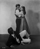 James Dean East of Eden standing in Black Vest and White Long Sleeve while Hugged by a Woman Photo Print - Item # VARCEL694162