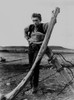 James Dean Posed in Black Vest and Long Sleeve Shirt while Left Hand on the Wood Leaning on a Wired Fence Photo Print - Item # VARCEL694178