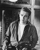 James Dean Posed in Black Long Sleeve Silk Jacket and White Round Neck T-Shirt with Left Hand on the Waist and Eyes Looking to the Right Photo Print - Item # VARCEL694194