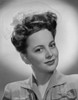 Olivia DeHavilland Portrait in Blouse with Earrings Photo Print - Item # VARCEL694265