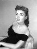 Ann Blyth sitting and smiling Photo Print - Item # VARCEL694444