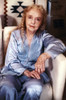 Lillian Gish sitting in Blue Pajamas Portrait Photo Print - Item # VARCEL694491