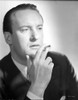 A Portrait Of George Sanders Smoking A Cigarette Photo Print - Item # VARCEL694664