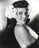 Paulette Goddard Posed with Flower on Head Photo Print - Item # VARCEL694659