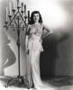 Paulette Goddard Posed with One Hand on Waist wearing Elegant Dress Photo Print - Item # VARCEL694692