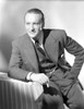 A Portrait Of George Sanders Smoking A Cigarette Photo Print - Item # VARCEL694679
