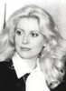 Catherine Deneuve in a Suit with Curly Hairstlye Photo Print - Item # VARCEL694725