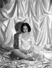 Mary Brian sitting in a White Shiny Dress in Photo Print - Item # VARCEL694778