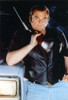 Brian Dennehy in Black Leather Jacket with Rifle Portrait Photo Print - Item # VARCEL694781