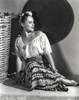 Paulette Goddard Seated and leaning wearing Blouse and Printed Skirt Portrait Photo Print - Item # VARCEL694844