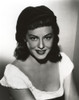 Paulette Goddard smiling wearing White Dress Portrait Photo Print - Item # VARCEL694837