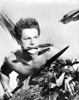A Promotional Still Of Johnny Sheffield Carrying A Spear Photo Print - Item # VARCEL694898