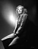Hillary Brooks sitting and smiling in Coat Photo Print - Item # VARCEL694911