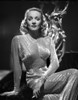 Marlene Dietrich Portrait wearing Glossy Dress with Sleeves Photo Print - Item # VARCEL695226