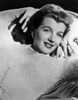 A Portrait Of Corinne Calvet Lying Down Photo Print - Item # VARCEL695322
