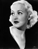 Betty Grable Posed in Black Dress Photo Print - Item # VARCEL695327