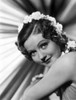 Nancy Carroll Portrait in Classic with Flower Headband Photo Print - Item # VARCEL695391