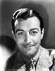 Robert Taylor smiling in Suit Photo Print - Item # VARCEL695406
