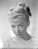 Gloria Grahame Red lipstick, Curly Hairdo wearing White Gown Photo Print - Item # VARCEL695416
