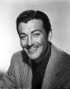 Robert Taylor smiling in Checkered Suit Photo Print - Item # VARCEL695418