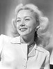Gloria Grahame Posed in a White Polo Dress Photo Print - Item # VARCEL695450