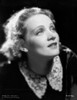 Marlene Dietrich Looking Up in Black and White Dress with a Smile Photo Print - Item # VARCEL695496