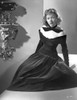 Gloria Grahame wearing Black Gown with Tie Portrait Photo Print - Item # VARCEL695500