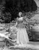 Madeleine Carroll standing in Gown with Hand on Hips Photo Print - Item # VARCEL695570