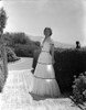 Madeleine Carroll standing in White Gown Photo Print - Item # VARCEL695574