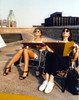 Illeana Douglas sitting Candid Photo Photo Print - Item # VARCEL695726