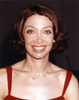 Illeana Douglas Posed in a Red Dress with a Necklace Photo Print - Item # VARCEL695722
