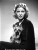Mary Carlisle Portrait Holding a Dog Photo Print - Item # VARCEL695747
