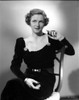 Irene Castle sitting on a Black Dress Photo Print - Item # VARCEL695795