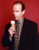 Kelsey Grammer Posed in a Suit and Tie with Red Background Photo Print - Item # VARCEL695816