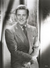 Kirk Douglas smiling in Formal Outfit with Necktie Photo Print - Item # VARCEL695819