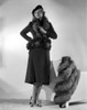 Irene Castle wearing a Black Dress with Furry Coat Photo Print - Item # VARCEL695902
